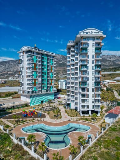 Продается стильная квартира в Махмутларе у моря всего за 52,000 EUR!